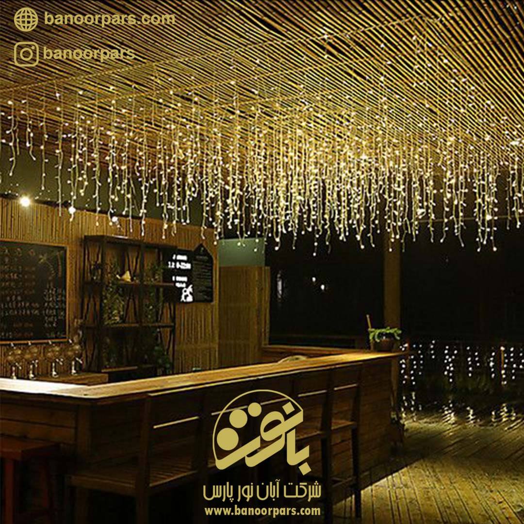 نورپردازی داخل فروشگاه کافه ، رستوران یا مغازه بالای کانتر فروش با استفاده از ریسه آویز قندیلی