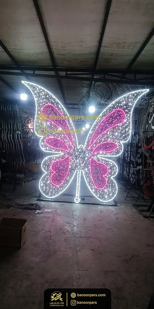 المان نوری پروانه به ارتفاع 3 متر ترکیب ریسه های سفید و صورتی ضد آب و دو سال ضمانت